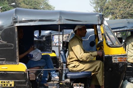 New Delhi scooter stalled in traffic  - what promise does the New India hold for investors?