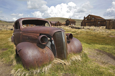 Rusting vintage car - whatever happened to simple travel terms and classic holidays?