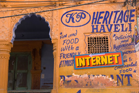 Signs of the times, an Internet cafe in an old heritage haveli in India