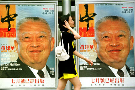 Hong Kong's first Chief Executive Tung Chee-Hwa on a magazine billboard in June 1997. Critics argue he gave in too easily to Beijing 