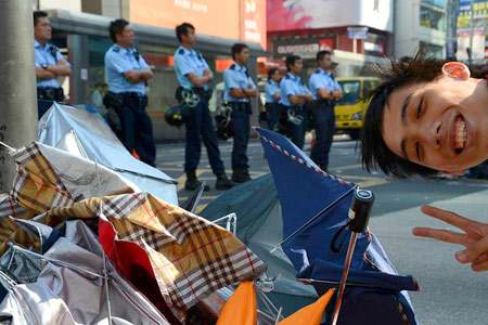 The umbrella protests brought Hong Kong to a halt late 2014 - police clear the debris