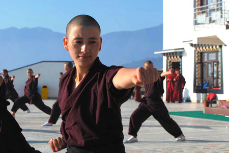 Martial arts are no longer a male preserve. Nuns practice kung fu at a Himalayan monastery